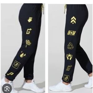 Pam & Gela Black Joggers with Yellow Graphics